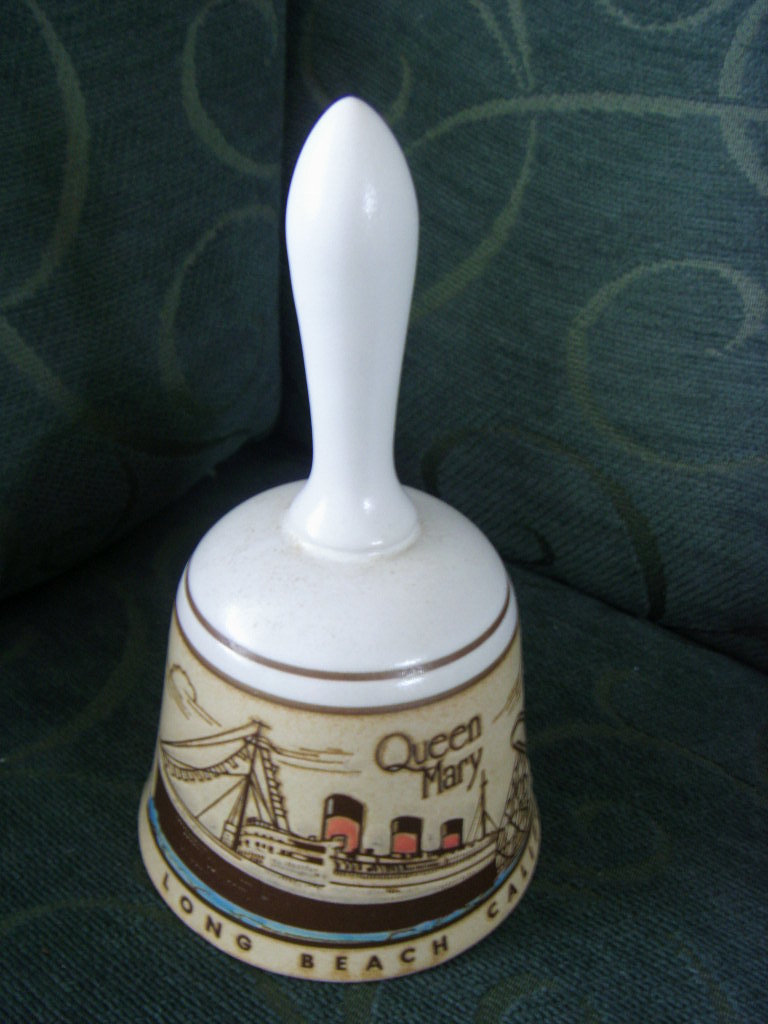SOUVENIR BELL FROM THE QUEEN MARY WHEN FIRST MOORED AT LONG BEACH [P]